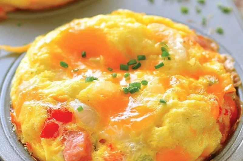 Denver omelet muffins baked with peppers, onions, and cheese